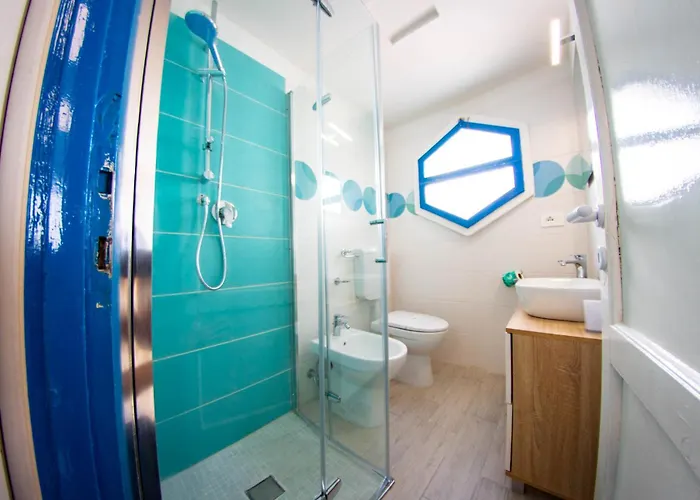 Eden アパートホテル コマッキオ